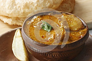 Alu dum - Alu Dum is spicy potato curry from Bengal photo