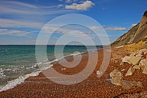 Alum Bay with red pebbles sand in Isle of Wight