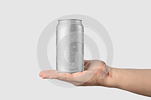 Aluminium drink can 330ml with water drops in a hand mockup template