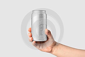 Aluminium drink can 330ml with water drops in a hand mockup template