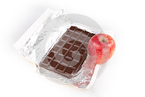 Aluminium foil of bar chocolate with fresh apple red