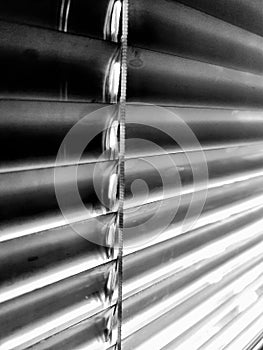 Aluminium louver shutter monochrome background. closed sunblinds texture