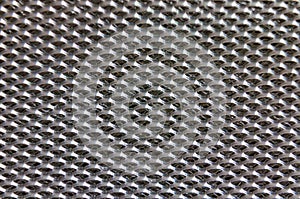 Aluminium mesh pattern on black background