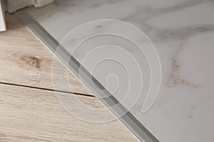 Aluminium platband for laminate and tile floor joints, floor connector, decorative strip or sill