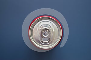 aluminium red cans soft drink put on blue texture background