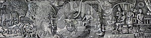 Aluminium and silver bas-relief with stories of Buddhism, dharma puzzles, and the history of the Wat Sri Suphan, or silver temple