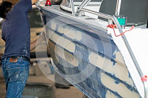 Aluminum boat painting procedure at service center