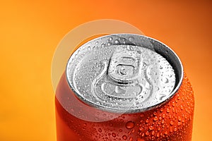 Aluminum can of beverage covered with water drops