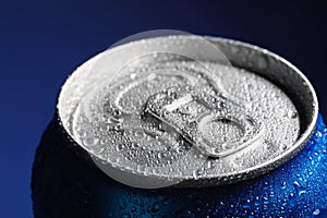 Aluminum can of beverage covered with water drops