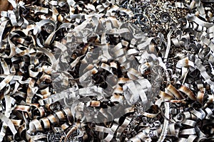 Aluminum chip waste after machining metal parts on a cnc lathe.