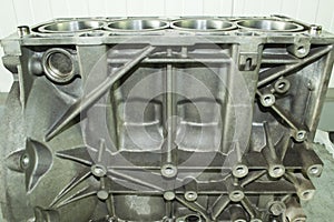 Aluminum cylinder block of automobile internal combustion engine. Side view