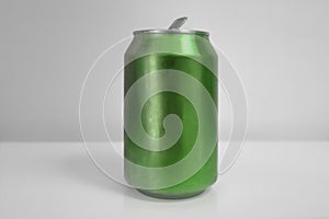 Aluminum Dark Green Soda Can over White Background photo