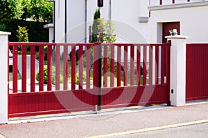 Aluminum dark red metal gate of suburb house steel door