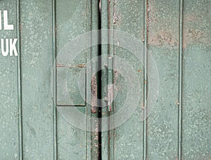Aluminum doors with vertical lines and handles texture