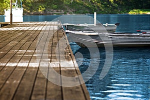 Aluminum Fishing Boats at Wood Dock