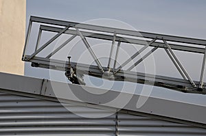 aluminum footbridge for washing windows above the skylight.