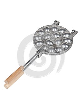 Aluminum frying pan mold for baking cookies with long wooden handle isolated on white background