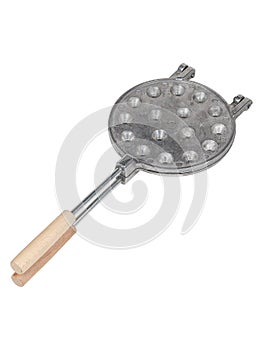 Aluminum frying pan mold for baking cookies with long wooden handle isolated on white background