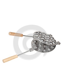 Aluminum frying pan mold for baking cookies with long wooden handle isolated on white background