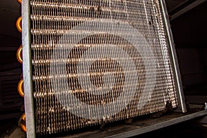 Aluminum grid for the copper condenser of the refrigeration unit