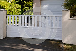 Aluminum home portal in white metal gate of suburb house door