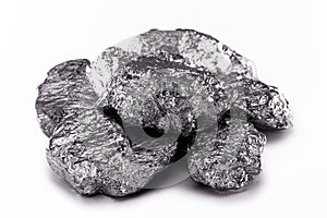 aluminum nuggets on a white background  industrial minerals