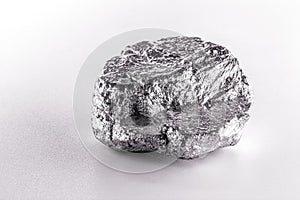 aluminum nuggets on a white background  industrial minerals