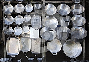 Aluminum pans sold on the road.