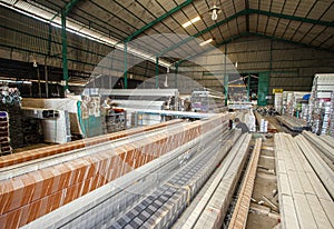 Aluminum pipe products in a warehouse in an aluminum processing factory.