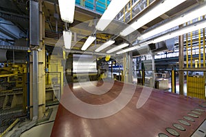 Aluminum rotates on machine in workshop photo