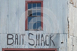 Aluminum siding and broken windows on an old new England working