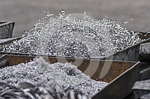 Aluminum swarfs in container