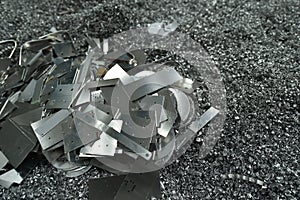 Aluminum waste resulting from pieces of aluminum metal being processed by cutting, cnc processing. photo