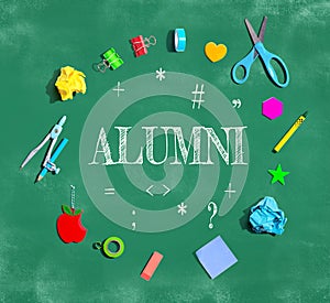 Alumni theme with school supplies on a chalkboard