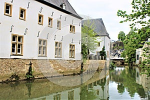 The Alzette River crossing the Grund, an old district in Luxembourg City photo