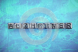 Alzheimer`s disease background concept with cubic metal letters