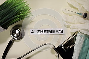 Alzheimer`s with inspiration and healthcare/medical concept on desk background