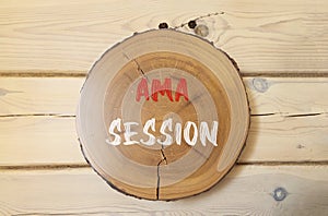 AMA ask me anything session symbol. Concept words AMA ask me anything session on beautiful wooden circle. Beautiful wooden wall