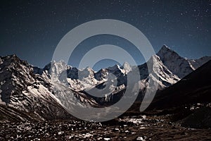 Ama Dablam mountain panoramic view on a starry.