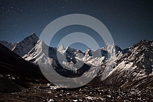 Ama Dablam mountain panoramic view on a starry.