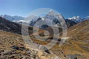 Ama Dablam mountain peak and trekking trail from Kongma la pass photo