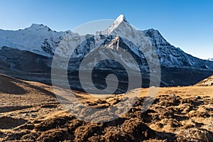 Ama Dablam mountain peak view from the way to Chukung Ri view point, Himalaya mountains range in Evererst region, Nepal