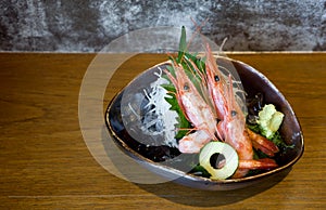 AMAEBI, sweet shrimp or spot prawns, served on ice with green tosaka nori and fresh wasabi shredded radish and green shiso leaf