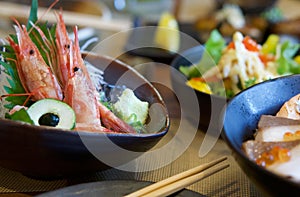 AMAEBI, sweet shrimp or spot prawns, served on ice with slice of japanese cucumber, green tosaka nori and fresh wasabi. There are