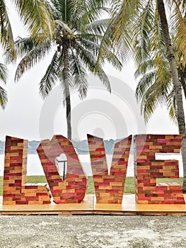 Amaizing design signage wording love at the garden.