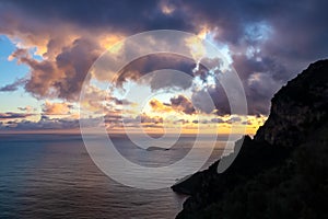 Amalfi - Sunset over island of Mediterranean sea on Amalfi Coast in Italy, Europe.