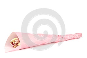 Amaryllis wrapped wrapped in a pink papaer on white