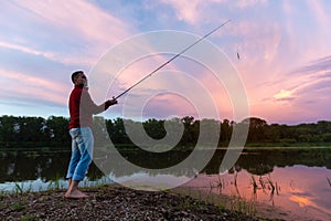 Amateur angler fishing on the coast