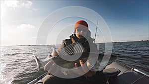 Amateur angler holds the Zander