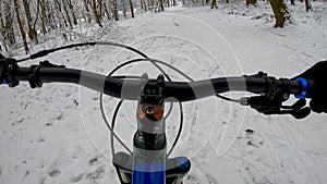 Amateur enduro rider on the bicycle in the winter season
